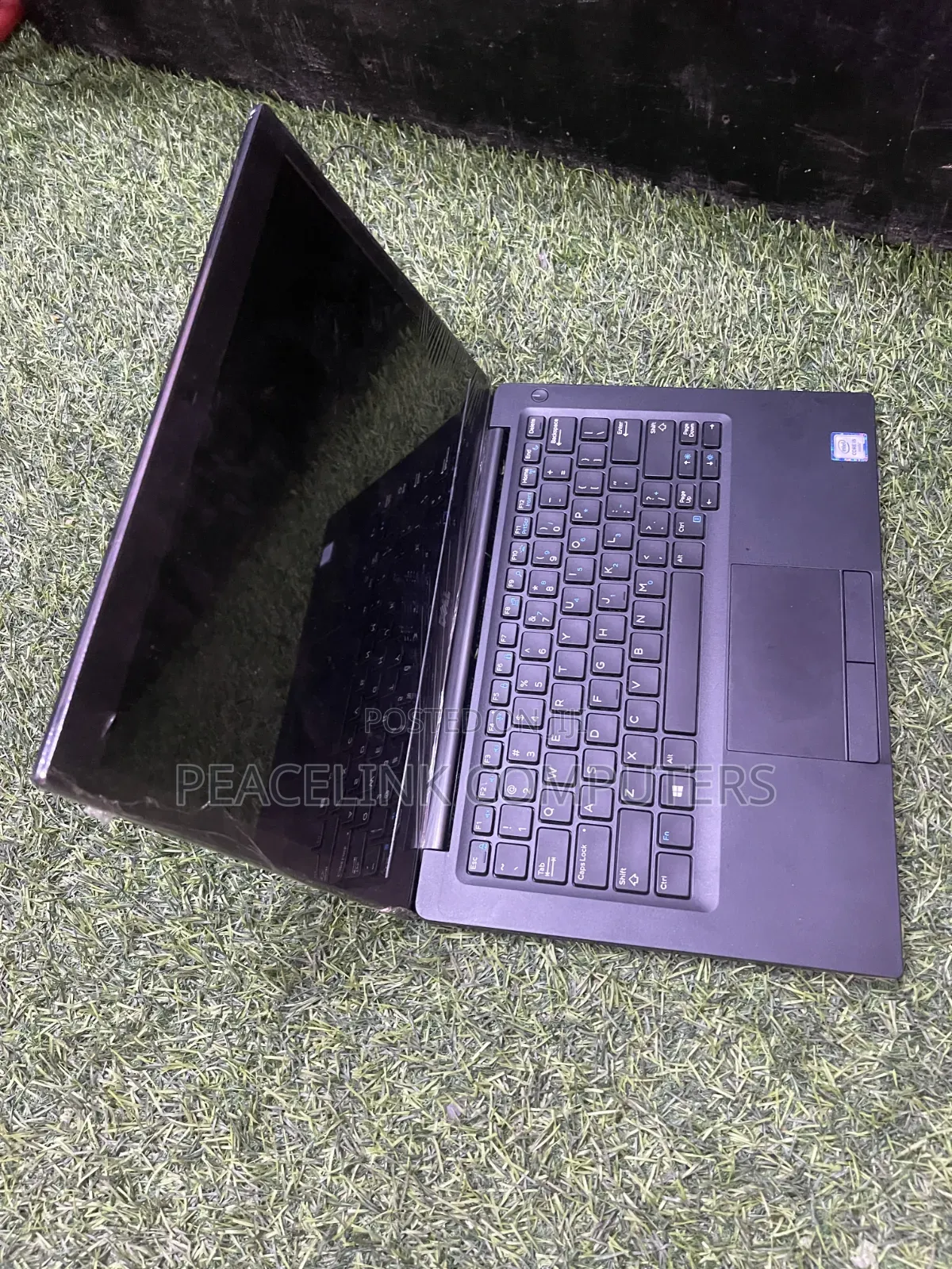 Dell Latitude laptop opened for inspection